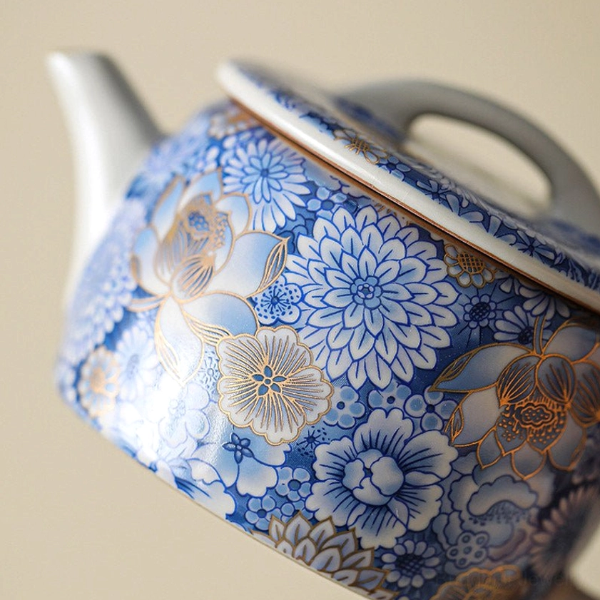 Handcrafted ceramic tea cup 55ml capacity lotus chrysanthemum design