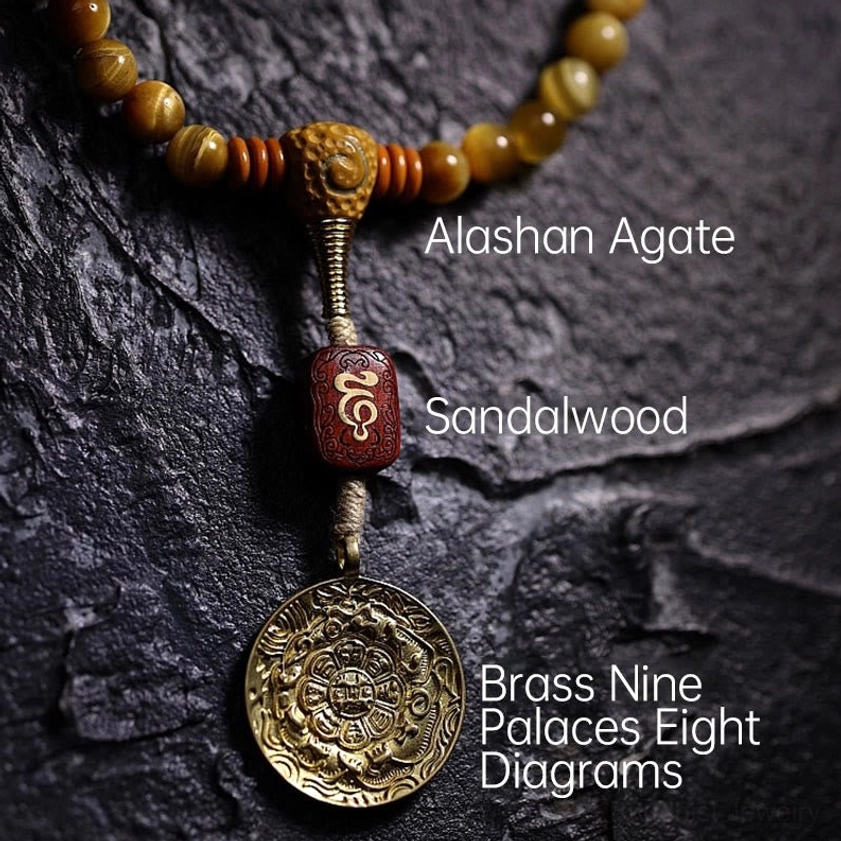 Handcrafted Tiger Eye Mala Beads showing natural variation and individual craftsmanship quality
