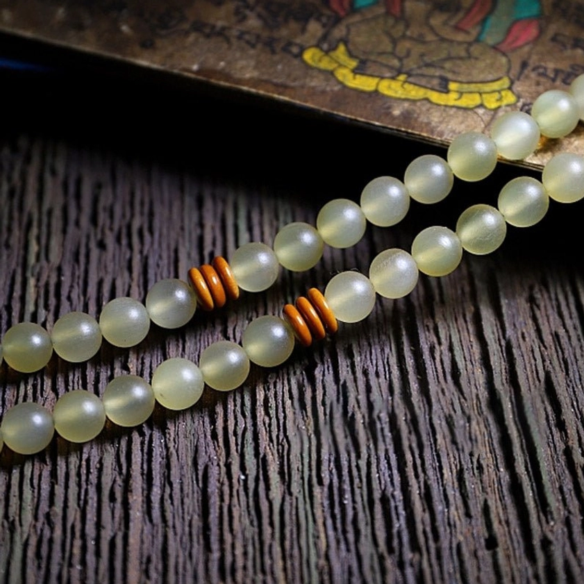 Handmade 108 bead prayer mala with natural materials and traditional craftsmanship