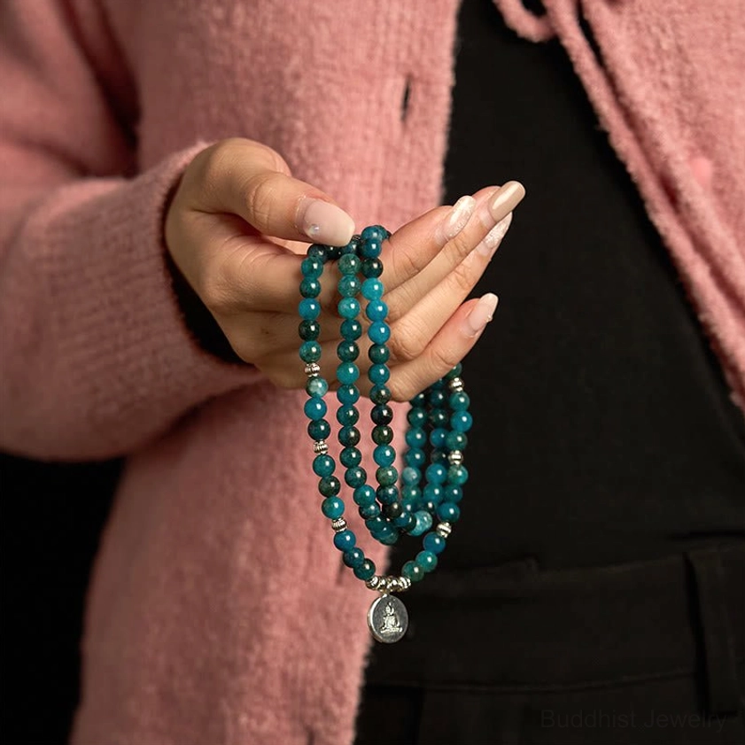 Handmade apatite mala prayer bracelet with sacred Buddhist symbol charm and elastic cord