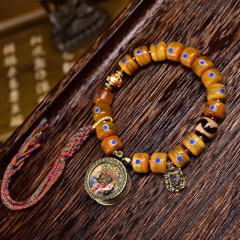 Handmade bone bead mala bracelet with healing stones and copper components - authentic Buddhist jewelry