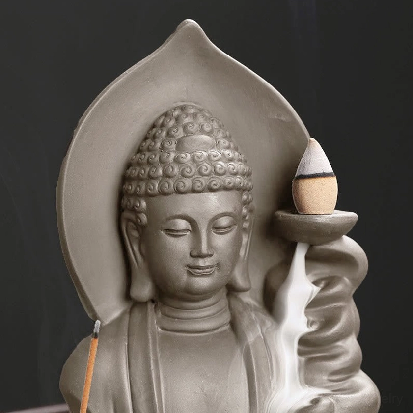 Handmade ceramic Buddha incense burner with lotus holder and meditation studio ambiance