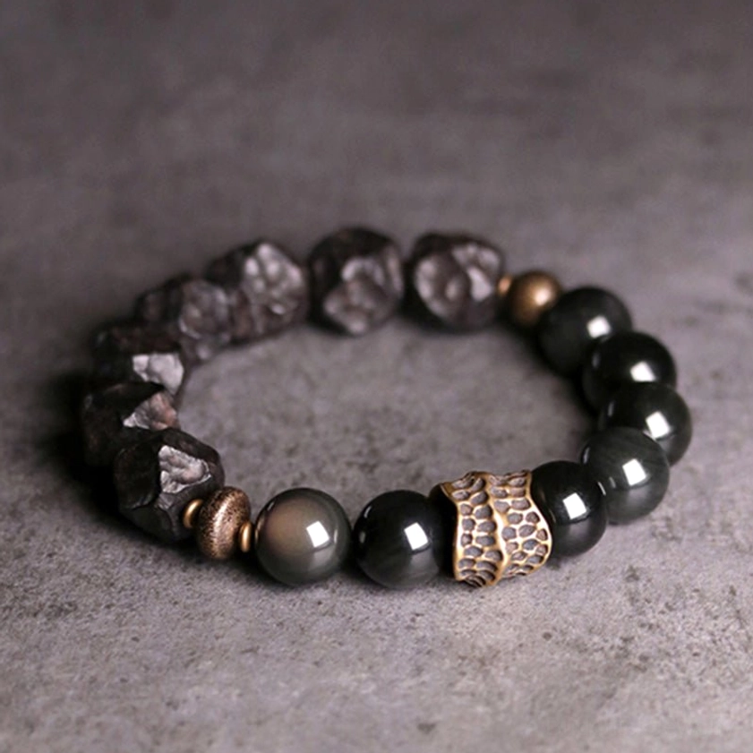 Handmade Buddhist couple bracelet - protective spiritual jewelry featuring obsidian, ebony, and copper materials