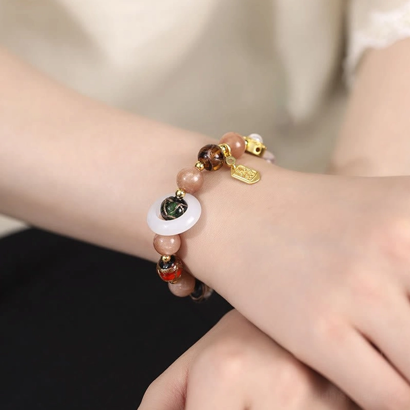 Premium handmade prayer wheel bracelet with natural tridacna and sun stone, artisan Buddhist jewelry