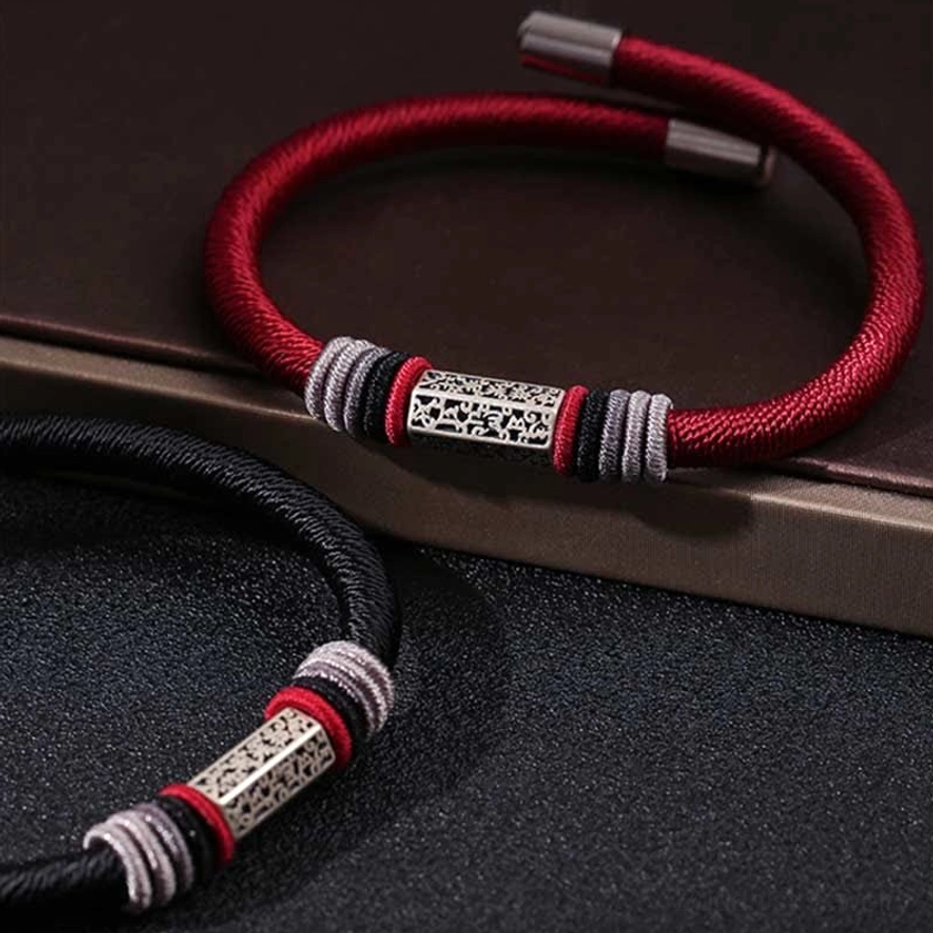 Handmade Buddhist red string bracelet with natural materials and traditional knotting technique