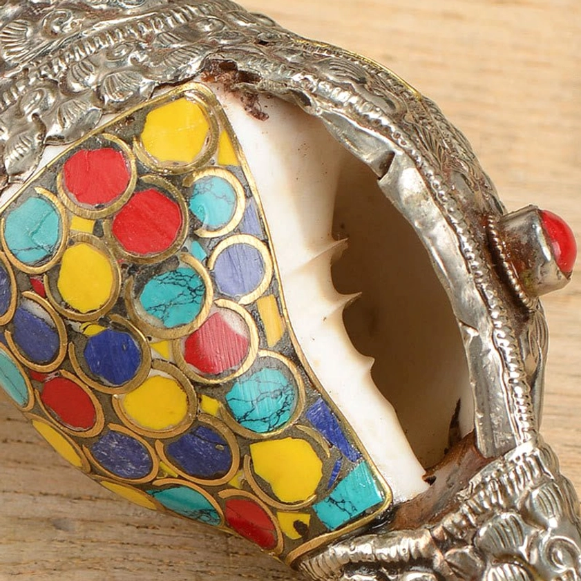 Handmade Buddhist shankha conch shell decoration with intricate silver carving and authentic enamel inlay work