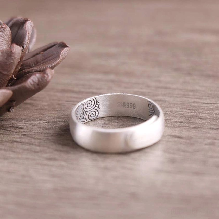 Handcrafted sacred symbol silver ring with Buddhist spiritual significance and matte silver finish