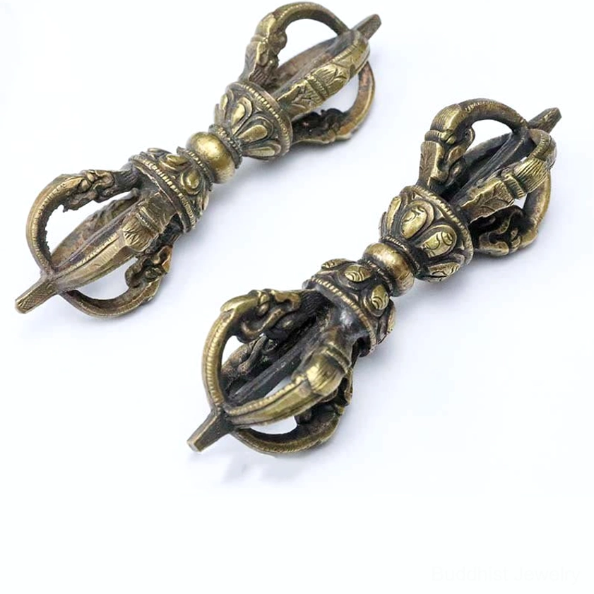 Handmade Buddhist vajra dorje showing spiritual symbol for meditation and enlightenment with traditional hand-carved details