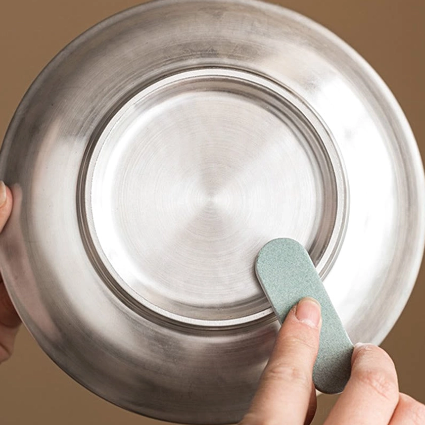 Artisan ceramic teacup manufacturing process, polished silver base and craftsmanship detail