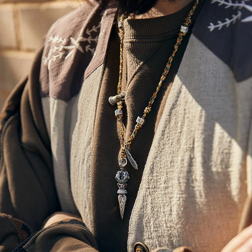 Handmade Buddhist Dorje Necklace Showcasing Intricate Silverwork and Sacred Symbolism of Indestructibility and Spiritual Strength