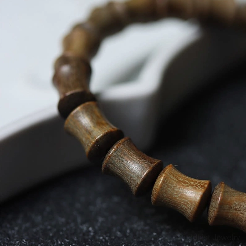 Handcrafted nine-eye dzi green sandalwood Buddhist bracelet quality craftsmanship showcase