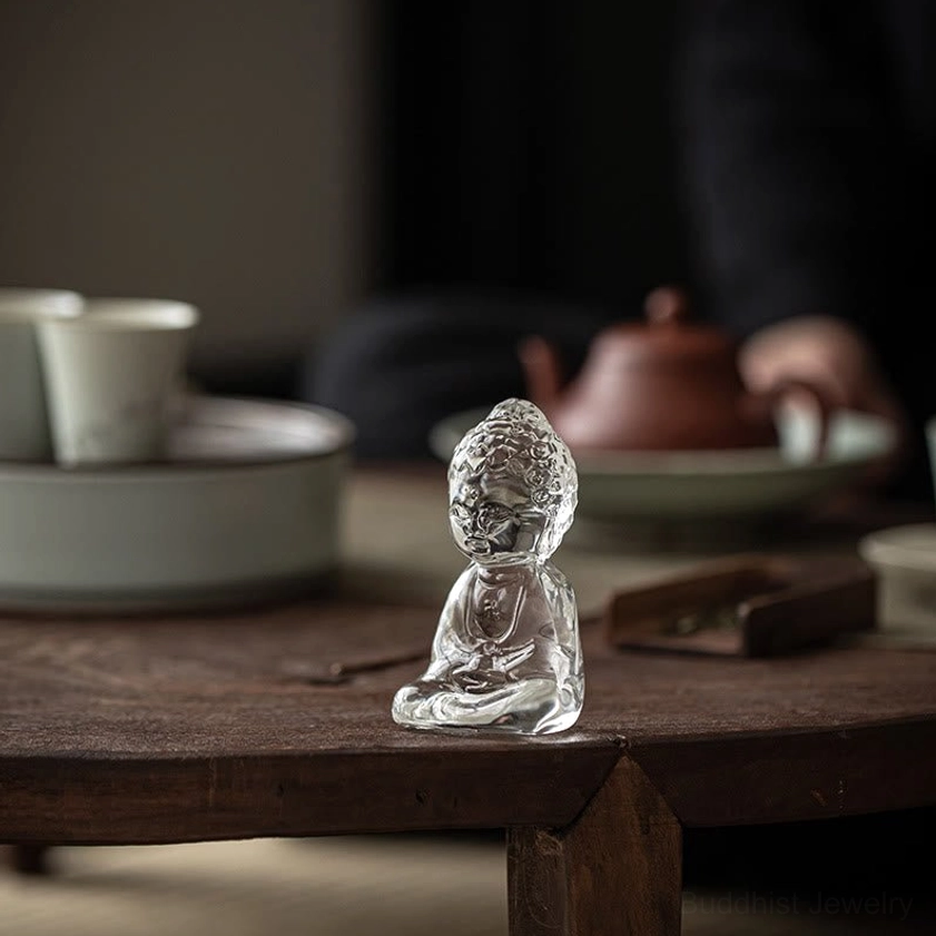 Handmade Liuli Buddha ornament featuring ancient Chinese glass craftsmanship and serene design
