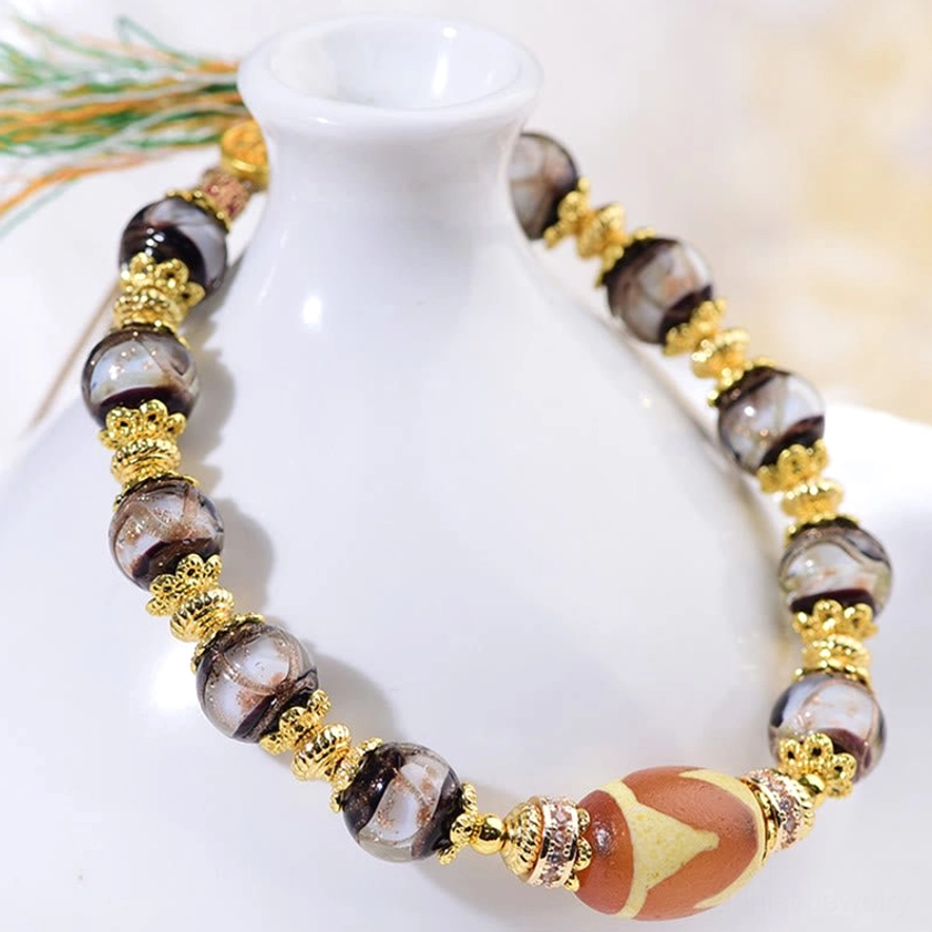 Liuli glass dzi beads bracelet with handmade craftsmanship and natural material authenticity markers