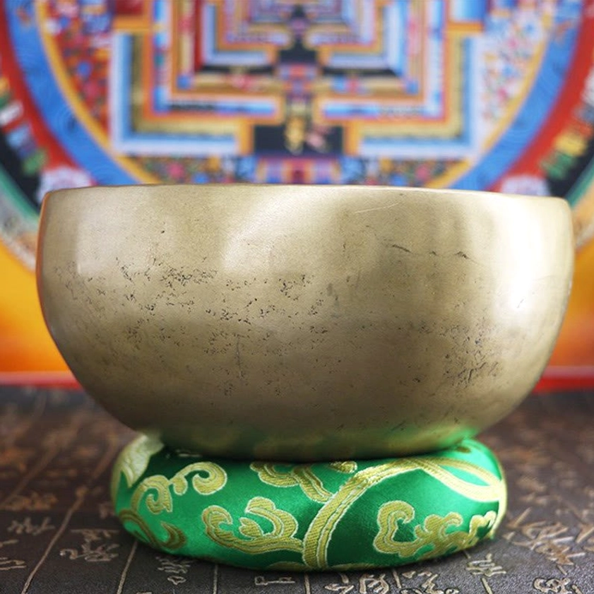 Handmade meditation singing bowl with natural golden brass finish