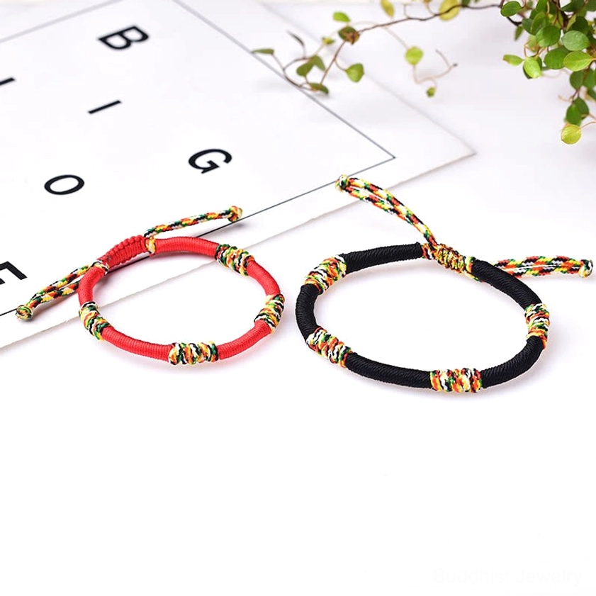 Handmade Buddhist King Kong knot bracelet with multicolor woven design for spiritual practice and protection