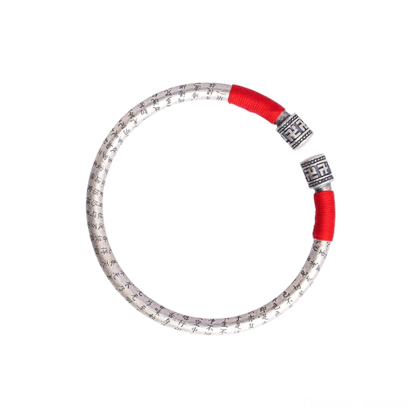 Handmade Buddhist spiritual red string bracelet with engraved Om Mani mantra charm, adjustable fit
