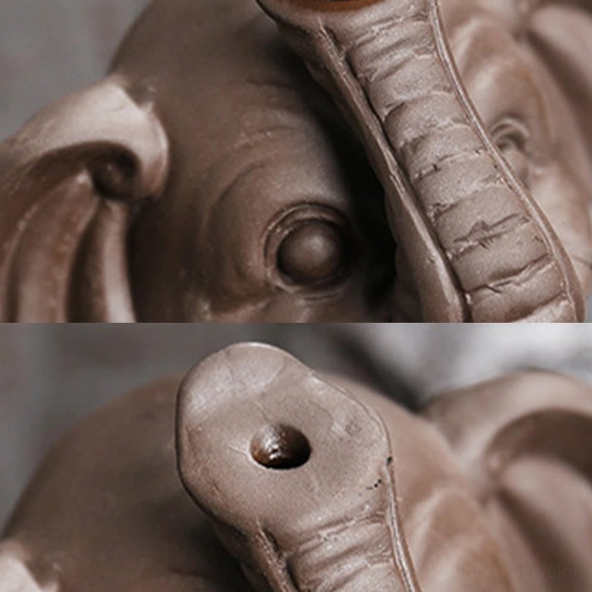 Handcrafted purple clay elephant incense holder showing artisanal quality and natural material finish