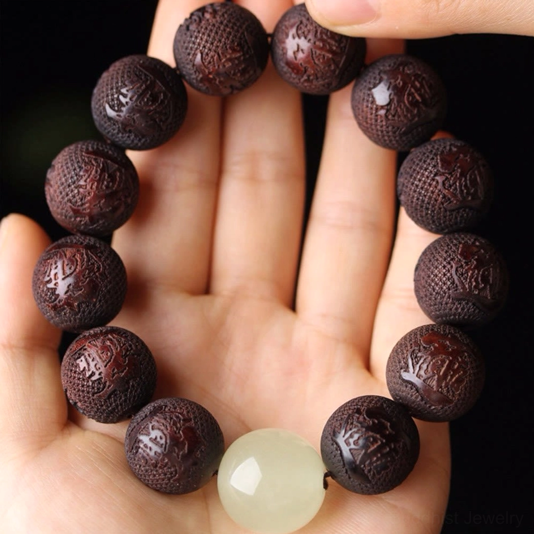 Authentic handmade rosewood Pixiu bracelet with natural grain variations and hand-engraved details