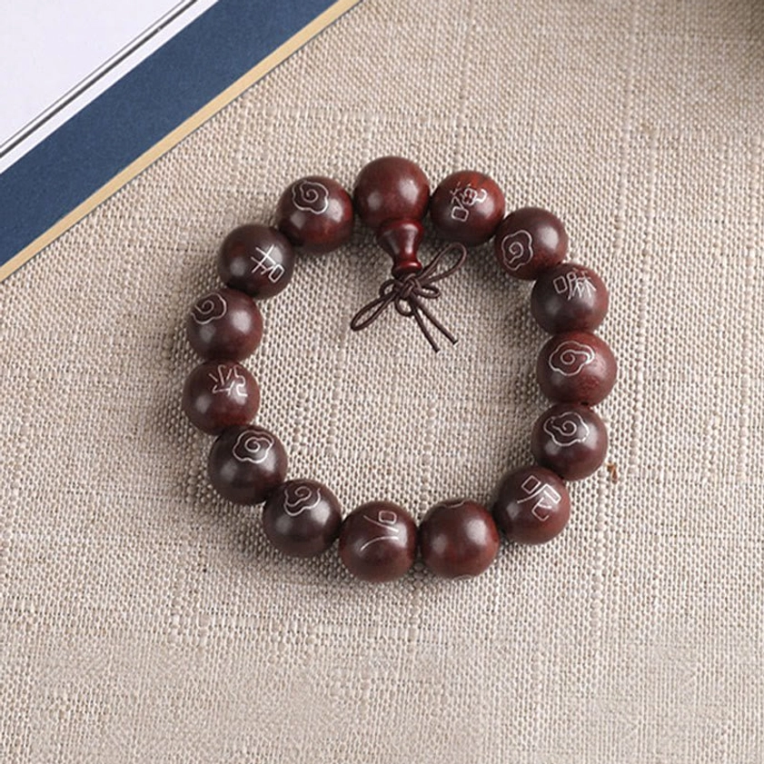 Handmade red sandalwood Buddhist prayer bracelet with 925 sterling silver inlay and traditional tassel accessory