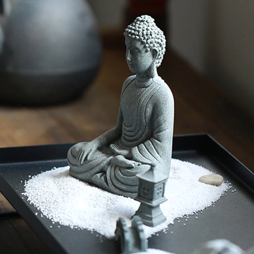 Handmade sandstone Buddha decoration showcasing traditional Buddhist craftsmanship and serene enlightenment symbolism