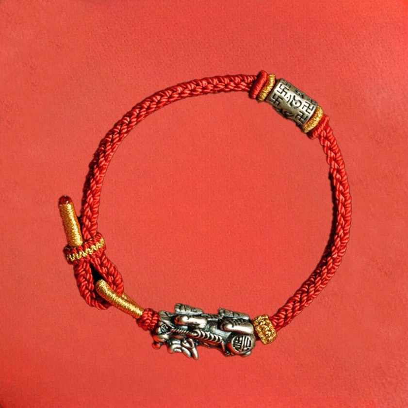 Handcrafted 925 sterling silver Pixiu Buddhist protection bracelet with red cord styling