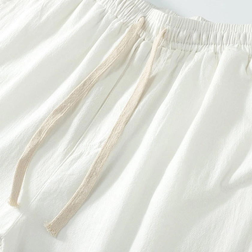 Hanfu ensemble featuring traditional cross-collar top and relaxed fit drawstring pants