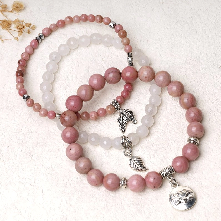 Handcrafted healing bracelet with natural gemstone beads featuring spiritual symbols and protective charms