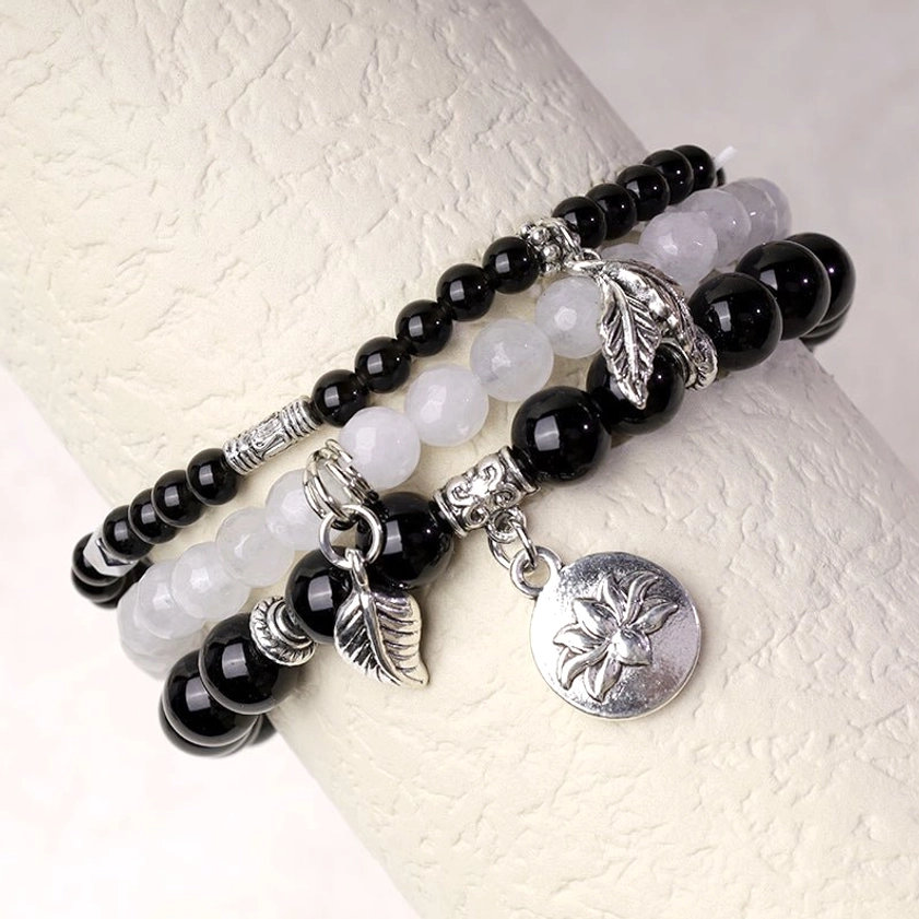 Handcrafted natural healing crystal bracelet with mixed gemstone beads and silver lotus charm - close-up detail