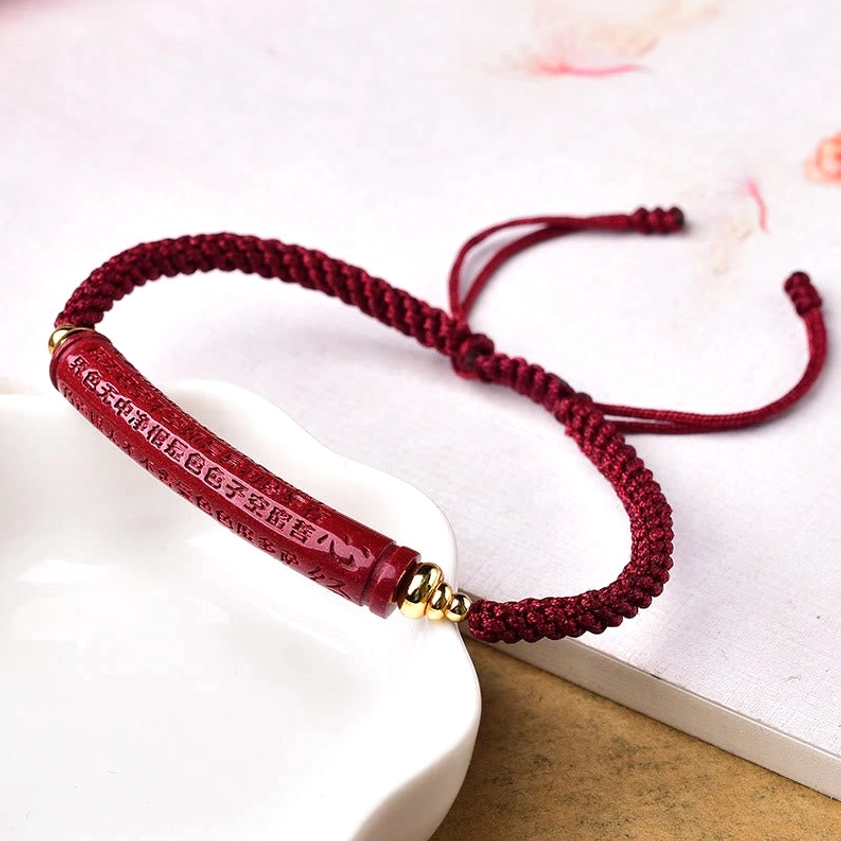 Chinese Heart Sutra engraved cinnabar tube on adjustable red braided cord Buddhist protection bracelet