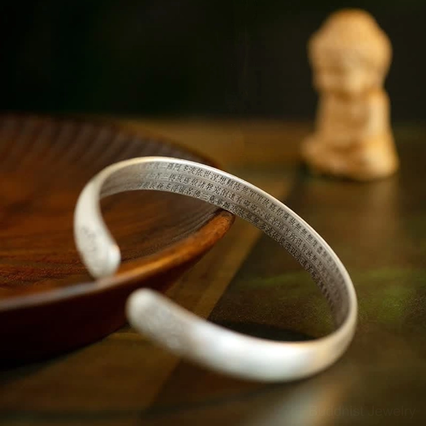 Heart Sutra engraved open cuff bangle with inner scripture inscription and brushed silver tone finish