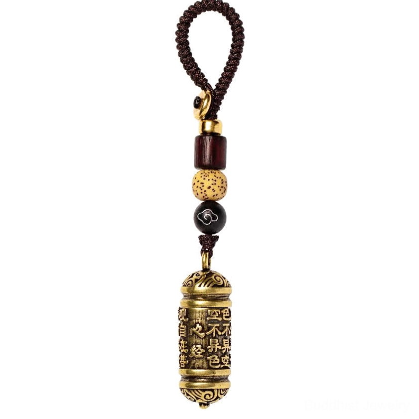 Heart Sutra copper keychain full display with clear engraved Buddhist sutra text