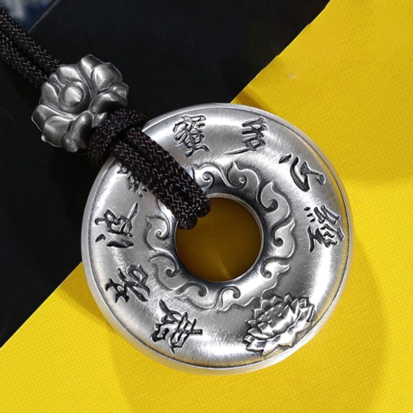 Sterling Silver Heart Sutra Peace Buckle Buddhist Pendant Close-up with Lotus Pattern and Matte Finish
