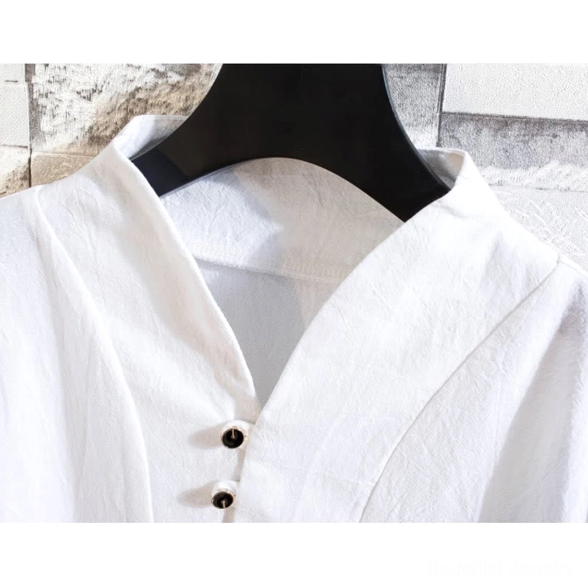 Henley shirt button placket close-up detail black decorative buttons cotton linen fabric
