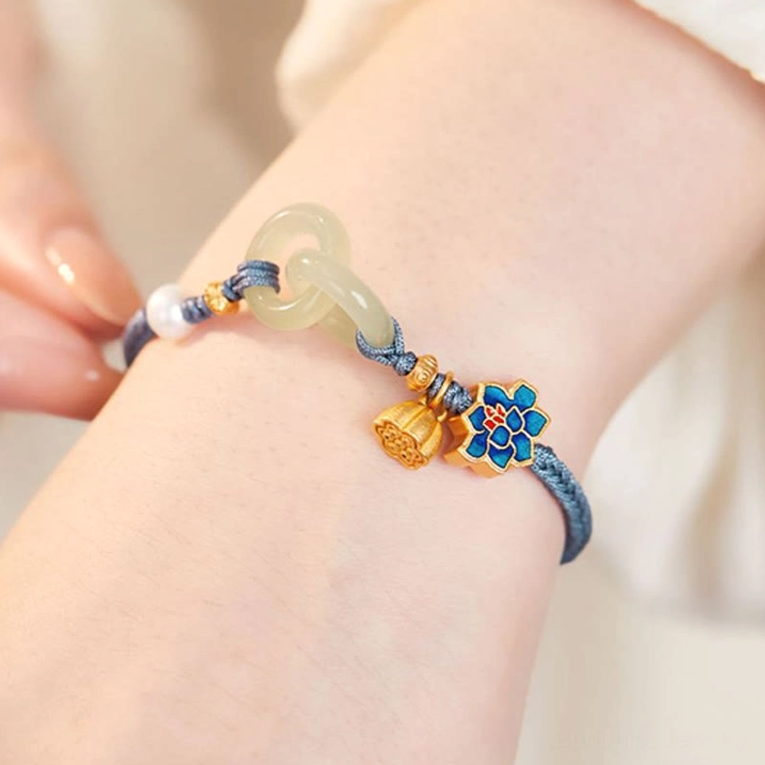 Hetian jade peace buckle fortune bracelet with braided red cord and gold lotus pendant