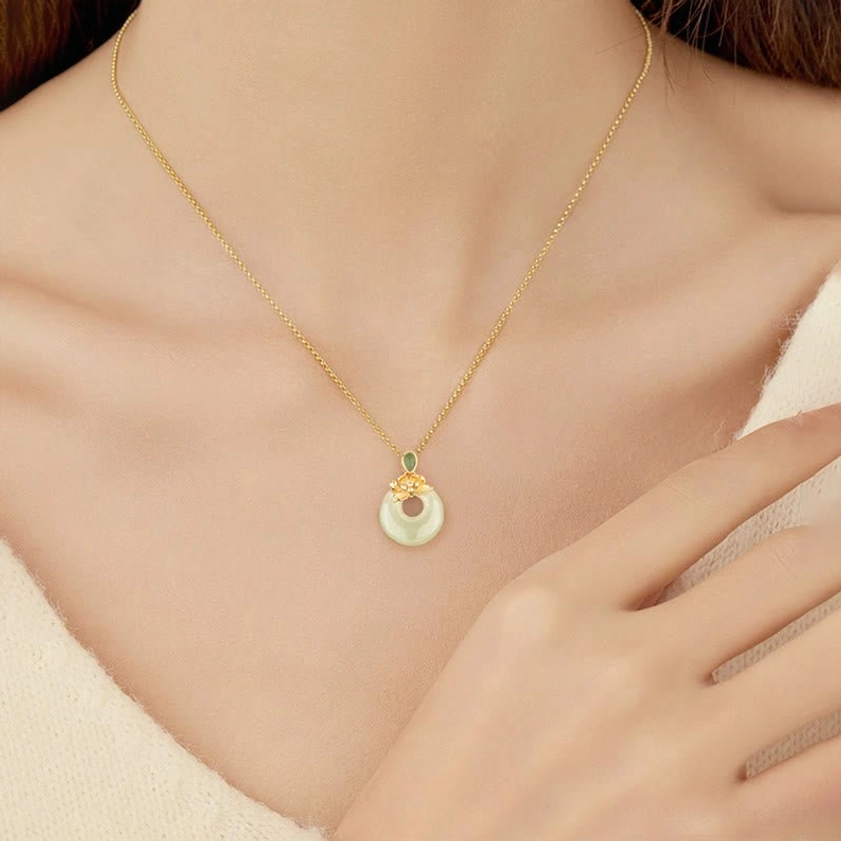 Hetian jade lotus necklace worn on neck, casual daily wear showing pendant at collarbone