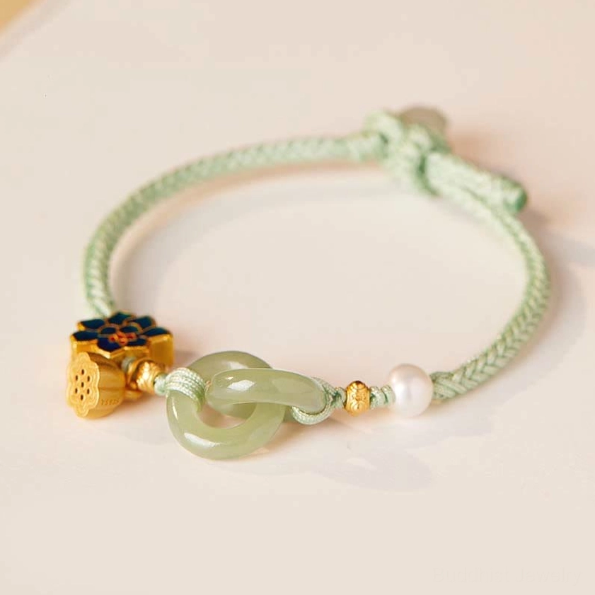 Hetian jade peace buckle lotus bracelet in mint green braided cord with all decorative elements