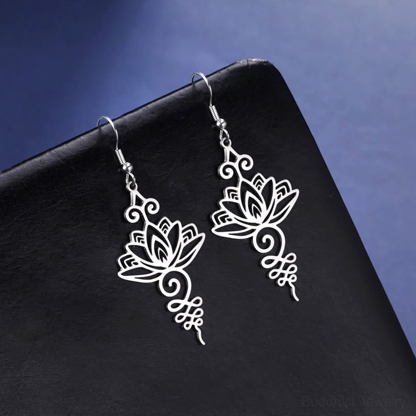 Buddhist lotus drop earrings silver tone close-up of intricate hollow filigree patterns