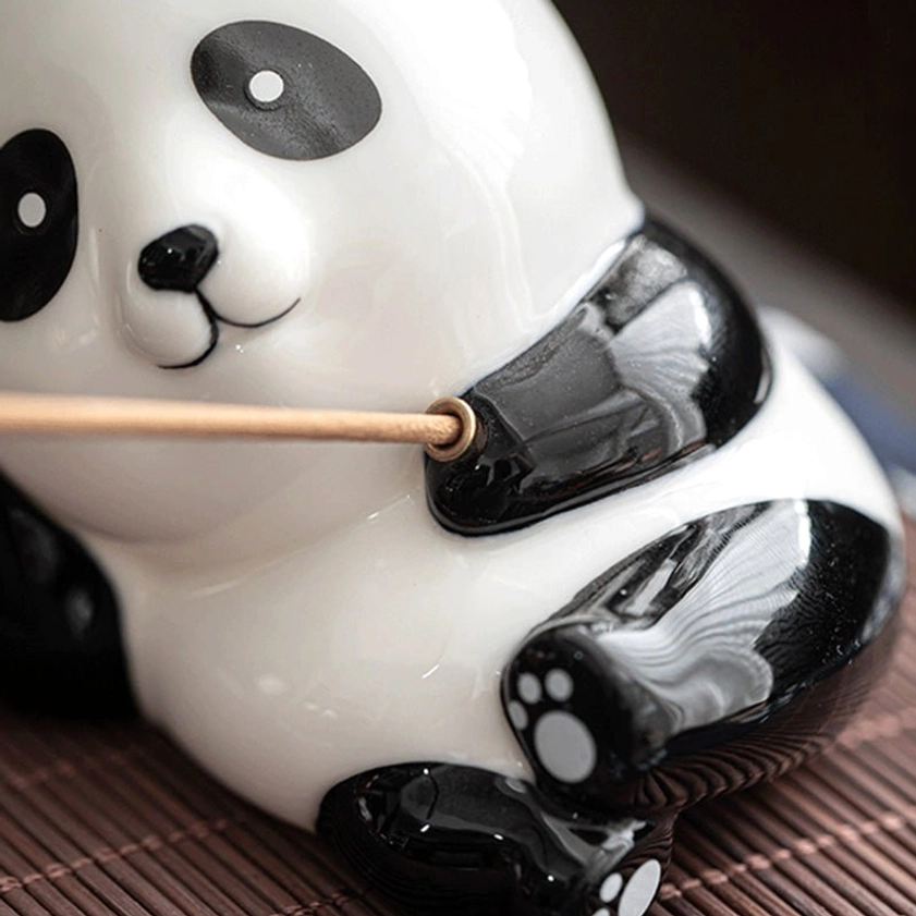Close-up detail of ceramic incense burner surface showing matte finish quality, gold collar accent, and smooth ceramic craftsmanship