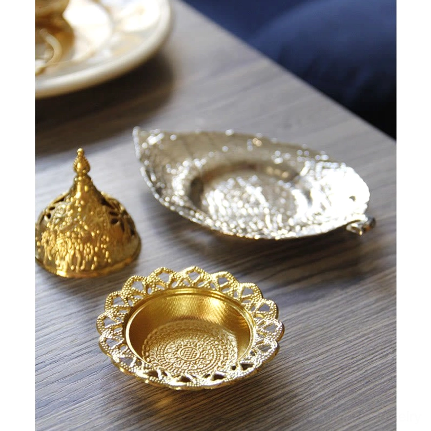 Incense burner holder demonstrating easy cleaning and maintenance with water rinse design