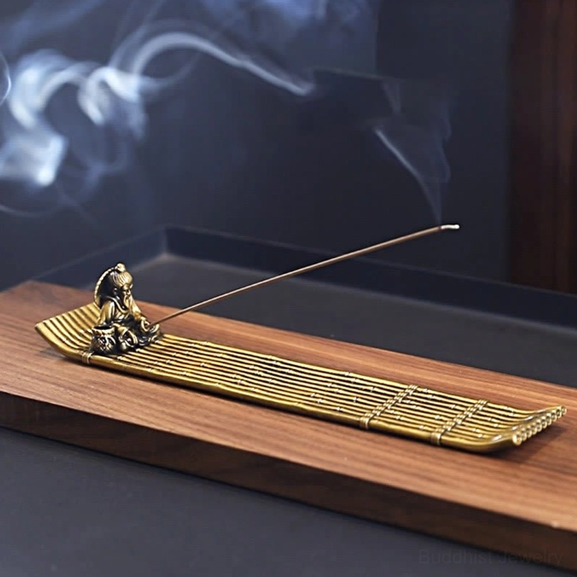 Meditation incense burner with thick aromatic smoke and bamboo strip textured design, three-quarter top angle showing spiritual purpose