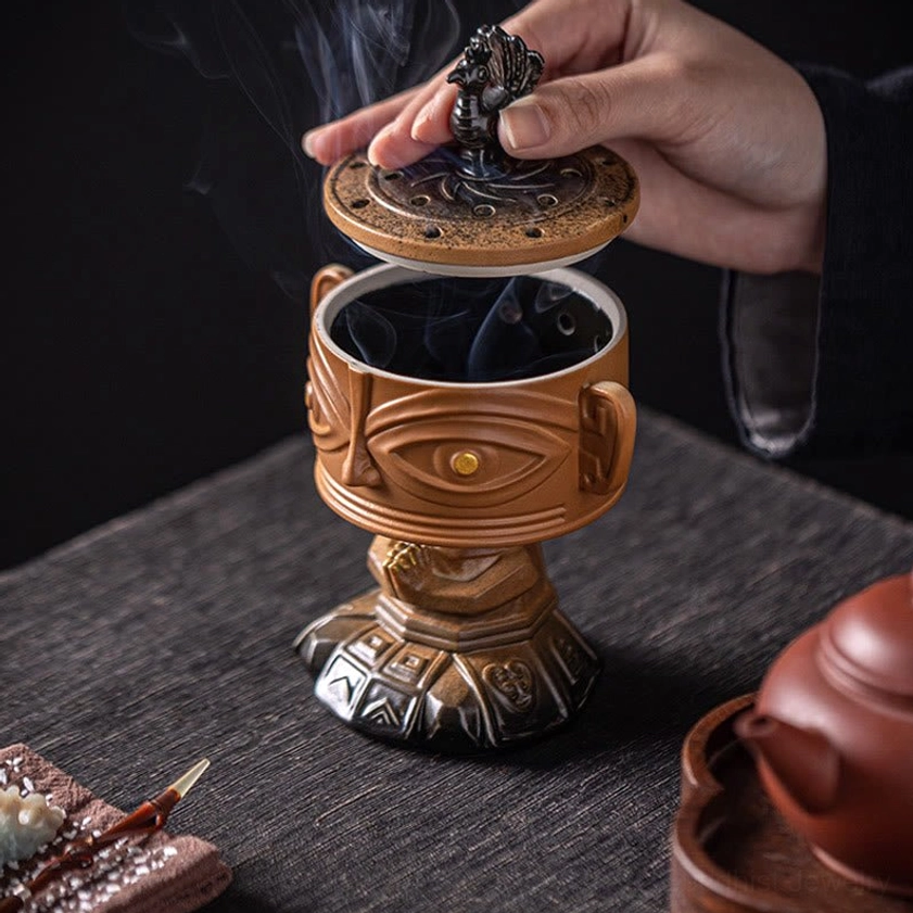 Handcrafted ceramic incense burner side profile view showing three-dimensional sculptural form