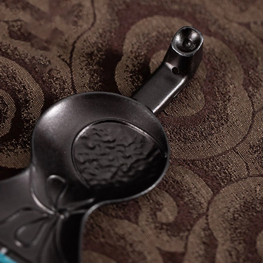 Close-up top view of incense slot with hammered grain texture inside gourd incense holder