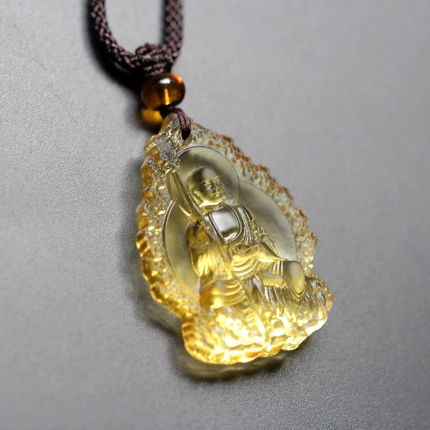 Ivory Ksitigarbha Buddha Liuli crystal pendant with irregular flame shape and embossed Buddhist figure
