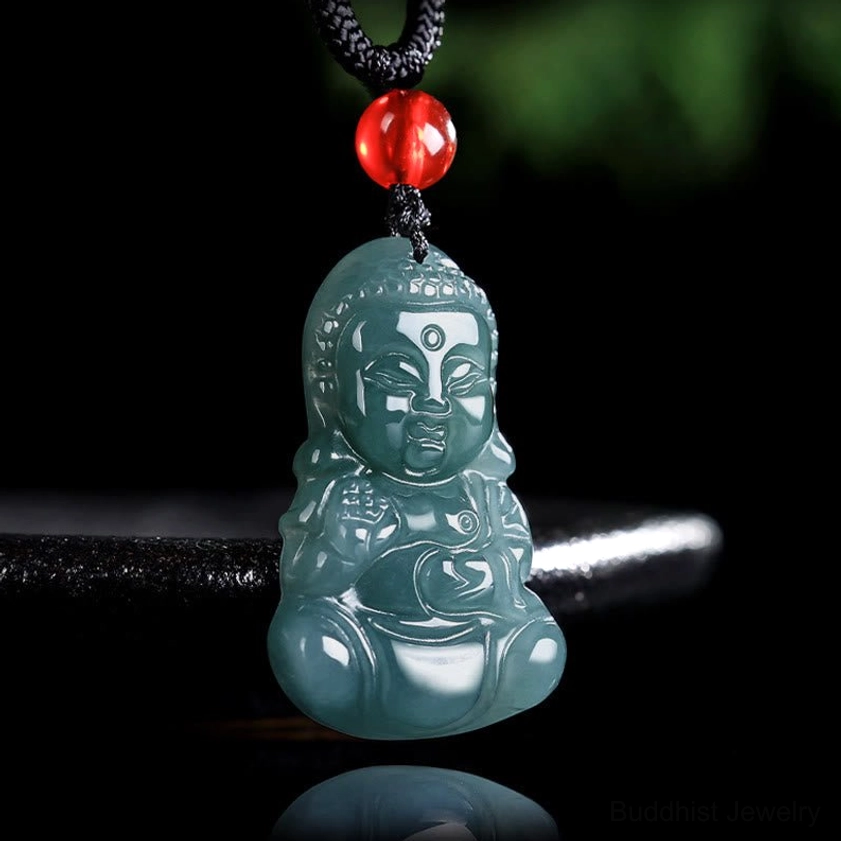 Jade Baby Buddha prosperity pendant necklace close-up front view with deep teal carved Buddha and red accent bead