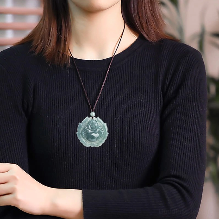 Woman wearing jade laughing Buddha necklace daily style with brown adjustable cord