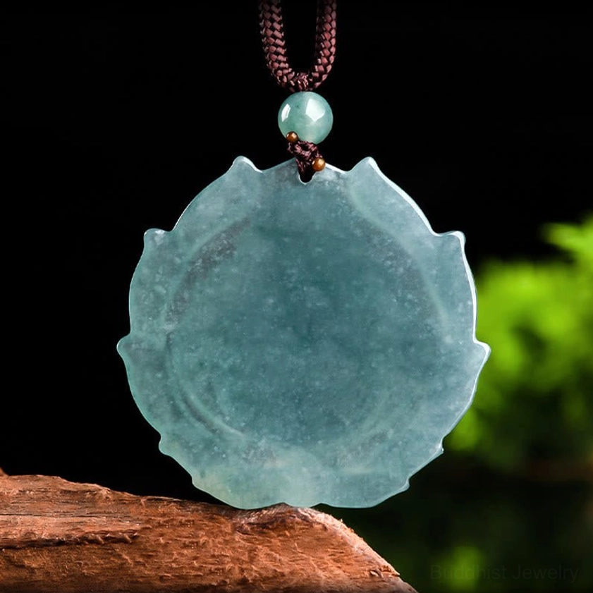 Rear view of hand-carved natural jade laughing Buddha pendant showing stone texture