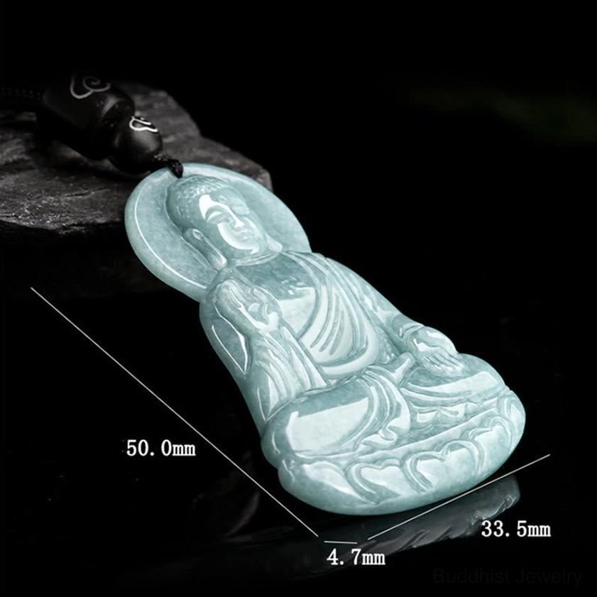 Amitabha Buddha jade pendant side angle view with dimension markings 50mm x 33.5mm x 4.7mm visible carved details