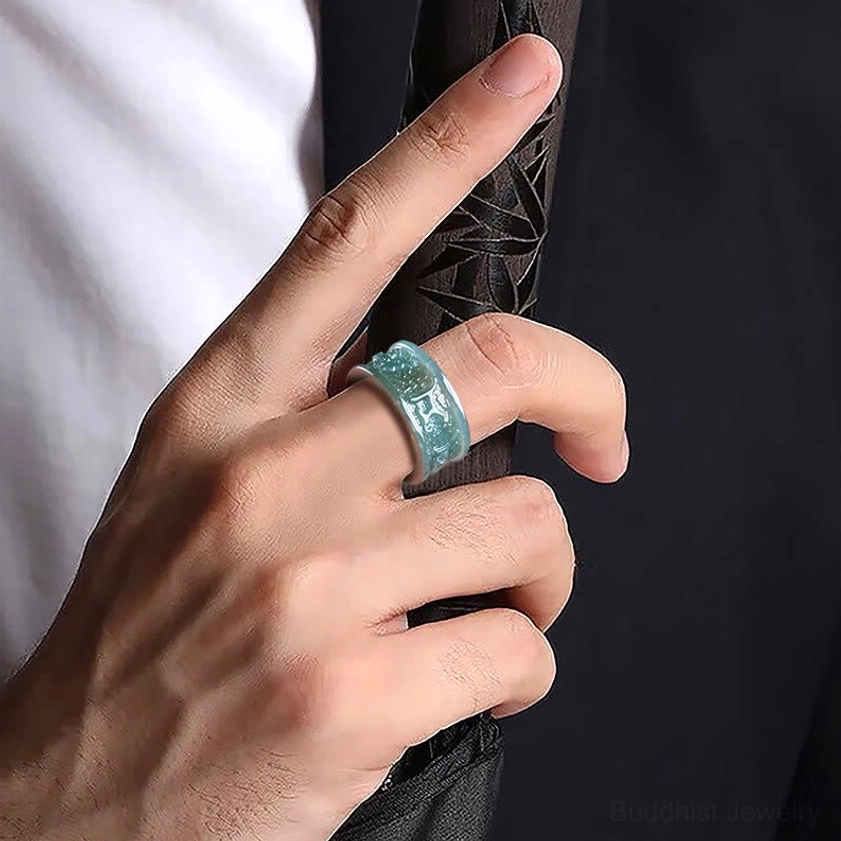Jade Om Mani Padme Hum Buddhist ring worn on hand, close-up lifestyle photo showing how the spiritual ring looks when wearing daily for meditation practice