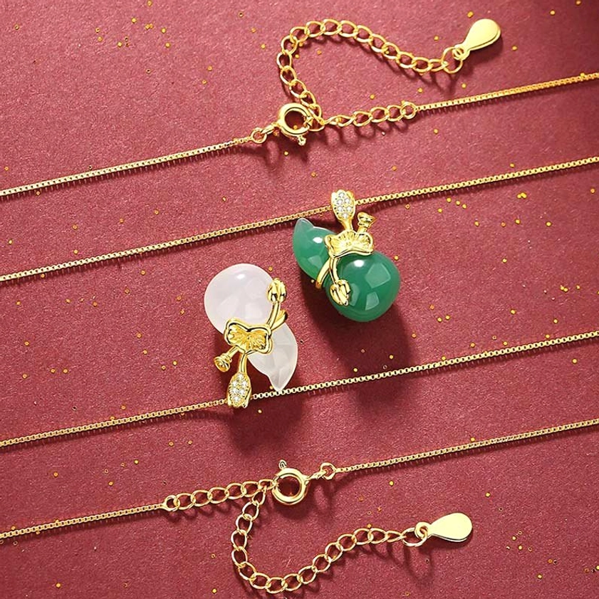 Adjustable jade gourd pendant necklaces and loose jade charms - green and white jade variants with gold chains displayed