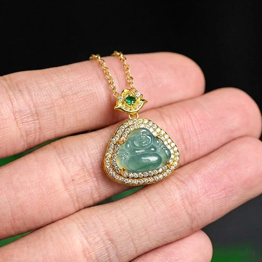 Hand-held Buddhist jade necklace showing delicate compact size and portable design